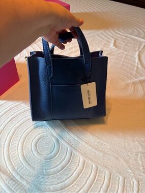 Plg classic Lola in Molono blue , brand new with tags and never used, nsnp home.